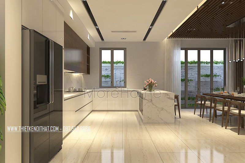 Khu vực bếp được thiết kế hiện đại với tông màu trắng mang đến sự sạch sẽ và ấm cúng tạo nguồn cảm hứng cho những món ăn ngon Thiết kế phòng bếp đẹp và sang trọng