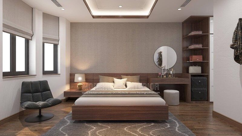 Nếu bạn là người ưa thích sự nhẹ nhàng trầm lắng thì bố trí nội thất phòng ngủ sử dụng gam màu gỗ nâu lại là sự lựa chọn khá hoàn hảo. Cách bố trí nội thất khá tinh tế dành cho nhà phố, biệt thự được kết hợp hài hòa giữa sự tinh gọn vuông vắn cùng đường cong nhẹ nhàng trong chiếc gương tròn trang điểm, chiếc đèn ngủ chụp cong và khối trụ ghế.