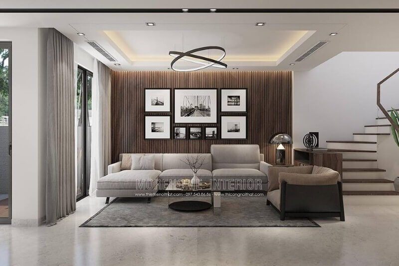 Mẫu gỗ ốp tường nhà đẹp tạo điểm nhấn ấn tượng cho phòng khách.