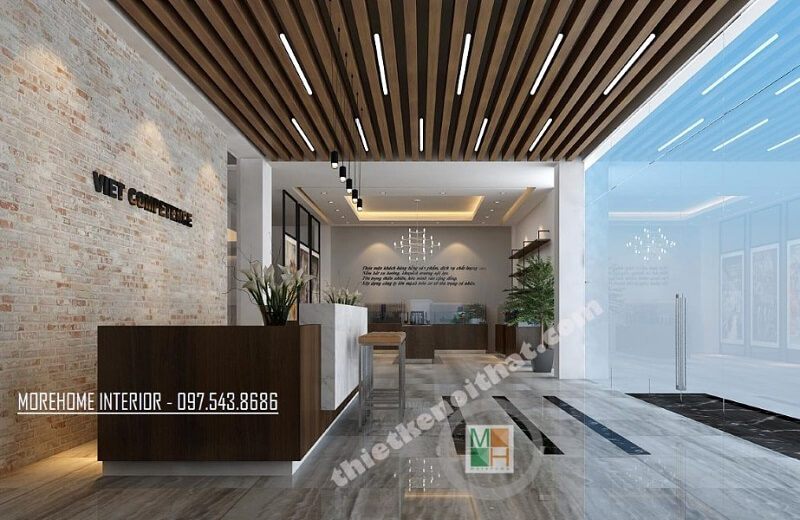 Thiết kế quầy lễ tân hiện đại với bàn làm việc gỗ công nghiệp cao cấp kết hợp đá nhân tạo màu trắng mang đến điểm nhấn nổi bật